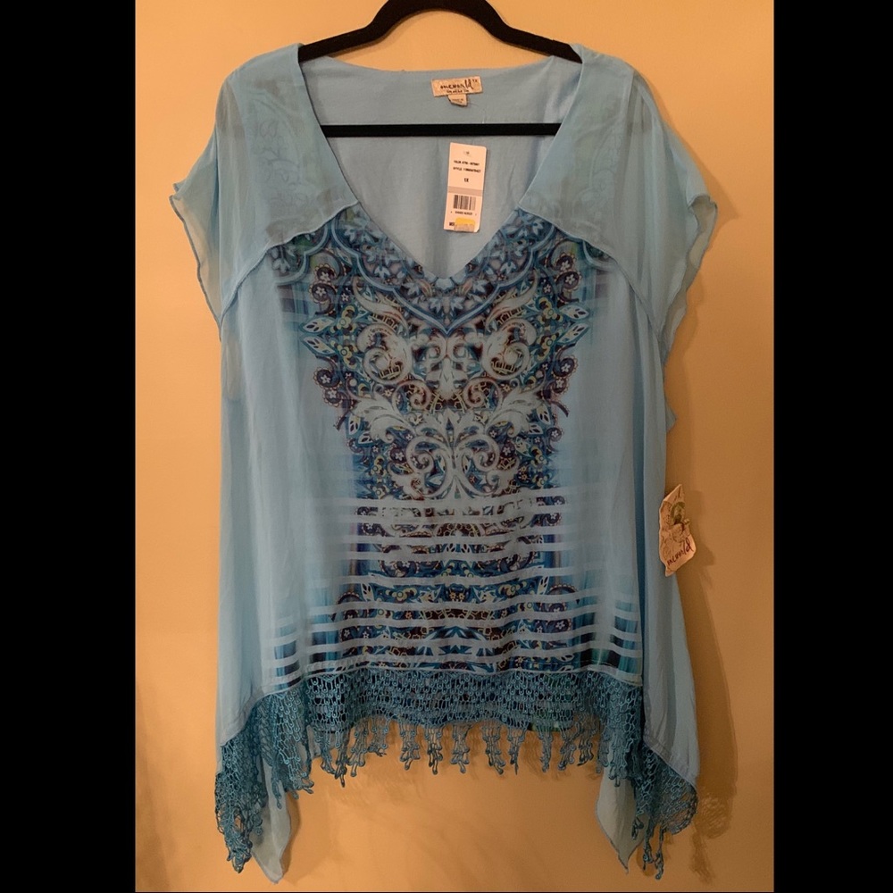 Flowy Blouse with Tasseled edge. 1X